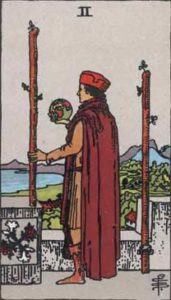 a picture of the 2 of wands card from the tarot, illustrated by Pamela Coleman Smith